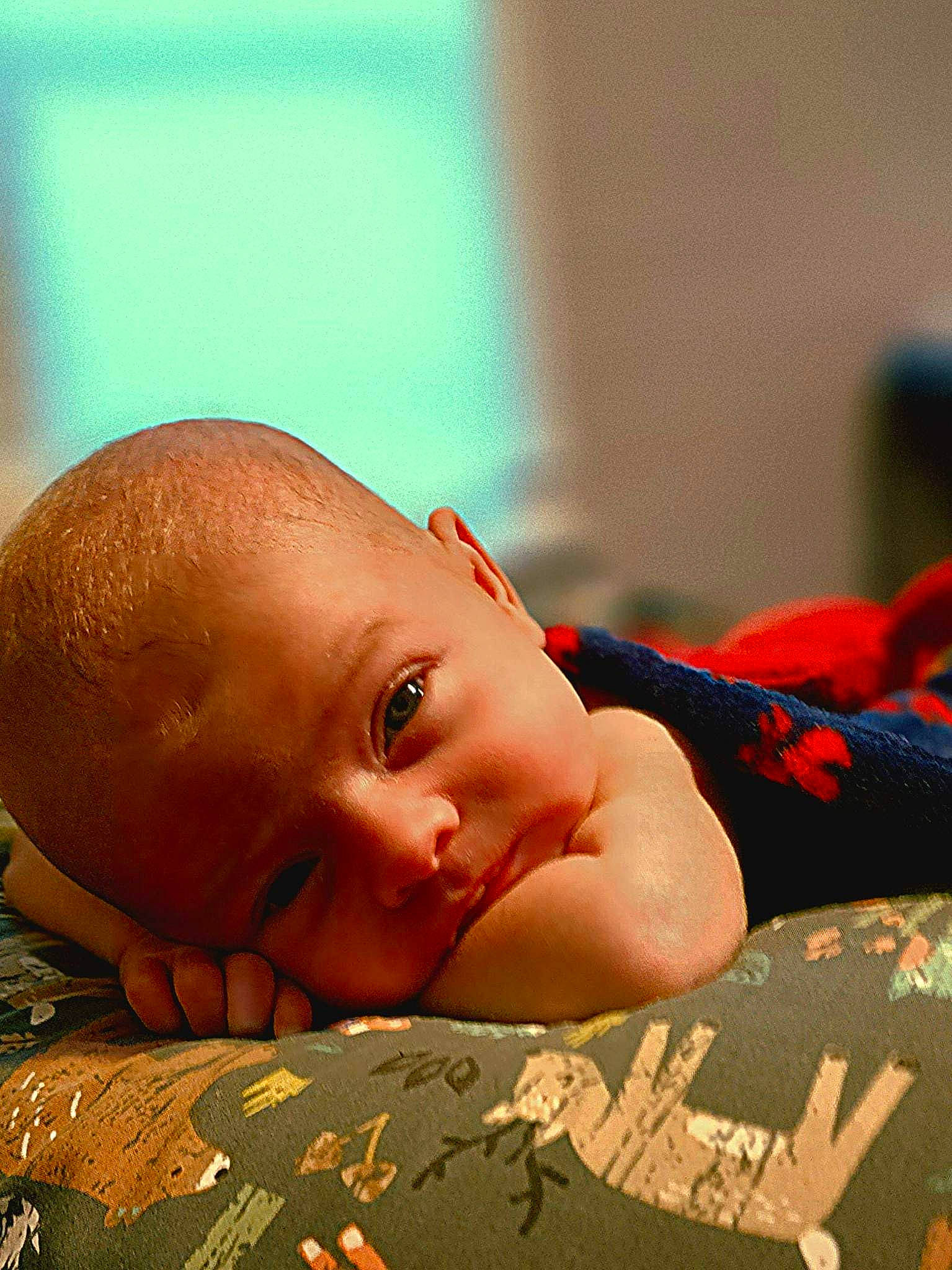 Wyatt is registered to the contest to win money with this photo: baby, bathing, carmine, cheek, chest, child, comfort, flesh, flooring, fun, happy, leisure, linens, person, portrait_photography, room, sitting, smile, toddler