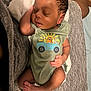 baby, newborn, sleeping, infant, onesie, tiger, jeep, clothing, blanket, foot, hand, skin, cute, peaceful, resting, indoors, soft, texture, person, portrait