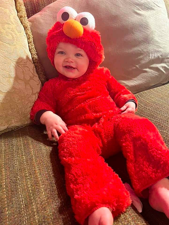 Koemason joined the competition — help win amazing prizes! baby, baby_toddler_clothing, cap, child, comfort, costume_hat, flooring, headgear, headwear, joy, knit_cap, magenta, orange, outerwear, person, pink, red, skin, sleeve, smile