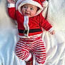 Alessio participe au concours pour gagner de l'argent avec cette photo : baby, infant, child, smiling, santa_costume, red_outfit, striped_pants, hood, hat, reindeer_socks, blanket, white_blanket, cozy, festive, holiday, portrait, lying_down, happy, cute, face