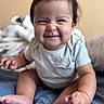 baby, infant, smile, grin, cute, chubby_cheeks, sitting, onesie, indoor, bed, blanket, face, expression, hands, feet, skin, hair, child, portrait, happy
