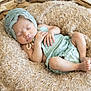 newborn, baby, sleeping, infant, blanket, basket, soft_texture, cozy, cute, peaceful, resting, clothing, headwear, closeup, indoors, portrait, small_hands, small_feet, delicate, baby_bonnet