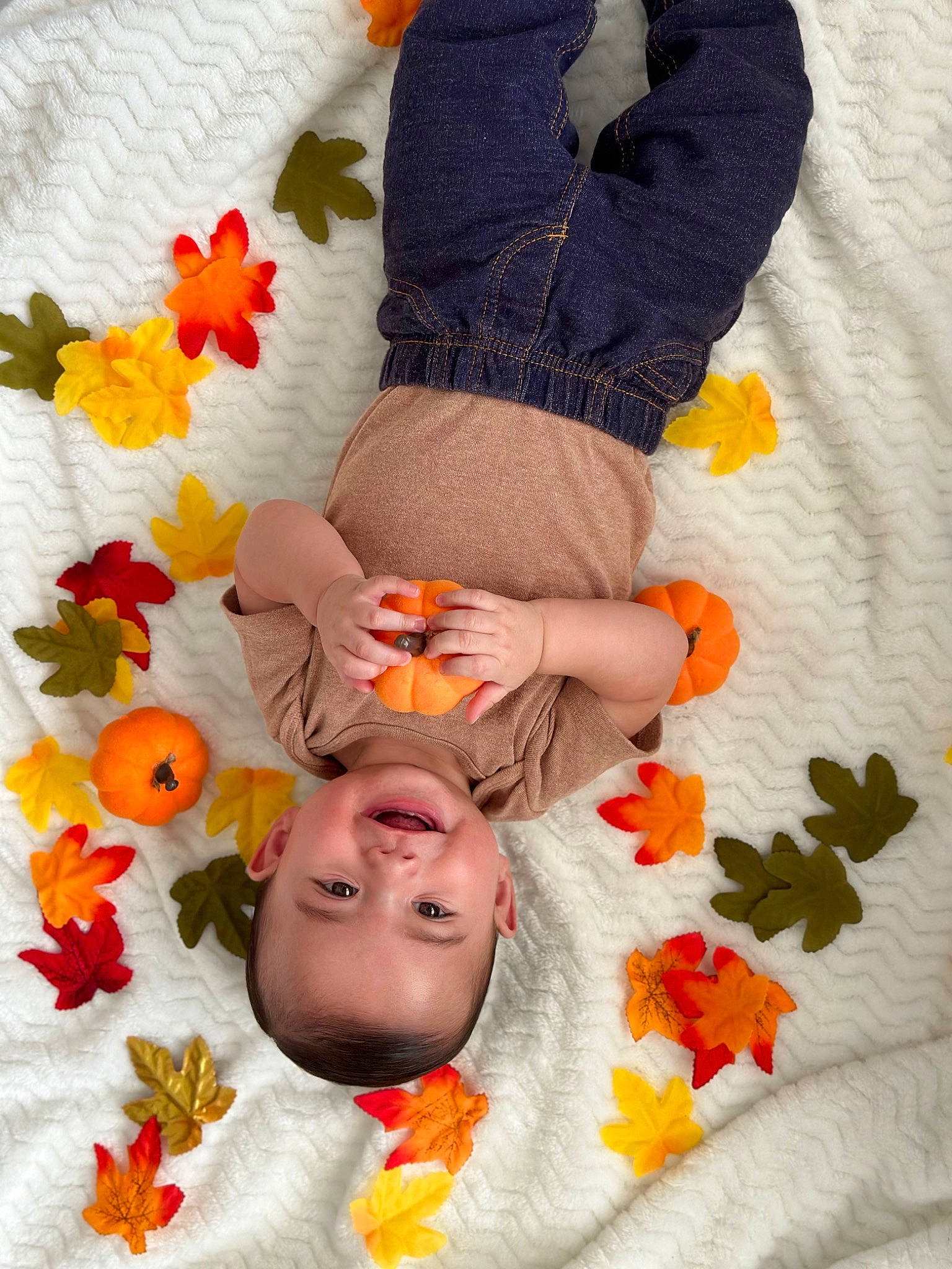 Marcelo joined the competition — help win amazing prizes! baby, baby_sleeping, baby_toddler_clothing, comfort, flooring, gesture, hand, happy, joy, linens, nail, orange, pattern, person, petal, plant, product, red, sleeve, textile