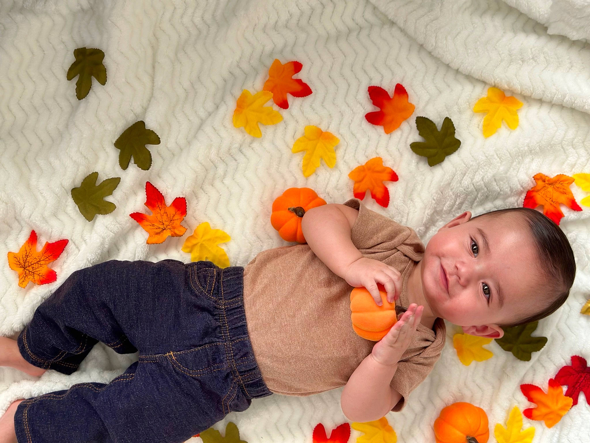 Marcelo joined the competition — help win amazing prizes! baby, baby_toddler_clothing, child, comfort, finger, flooring, happy, joy, leaf, linens, orange, pattern, people, person, plant, product, red, room, textile, toddler