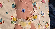 Luke is registered to the contest to win money with this photo: baby, bed, care, child, cute, diaper, hat, healthcare, hospital, incubator, infant, medical_equipment, medical_tubes, monitoring_wires, newborn, nursery, patient, pediatric, premature_baby, sleeping