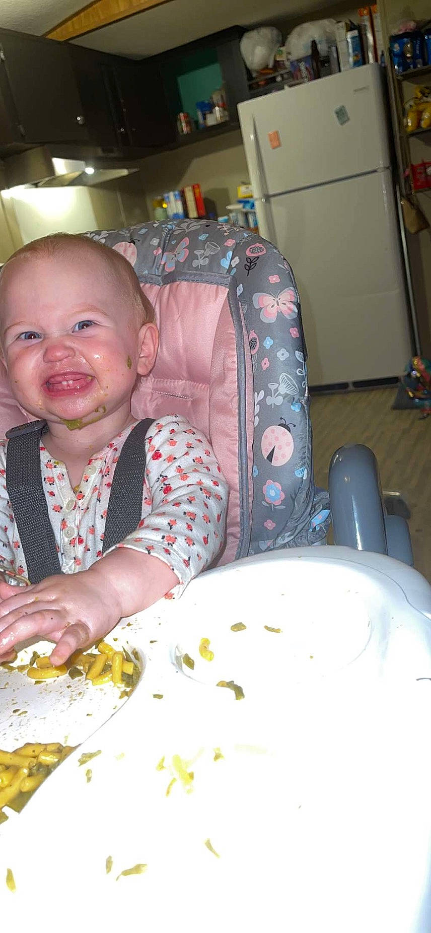 Mallory joined the competition — help win amazing prizes! baby, baby_toddler_clothing, chair, child, comfort_food, cooking, dishware, eating, event, food, fun, happy, person, plate, sitting, smile, spoon, sweetness, table, tableware