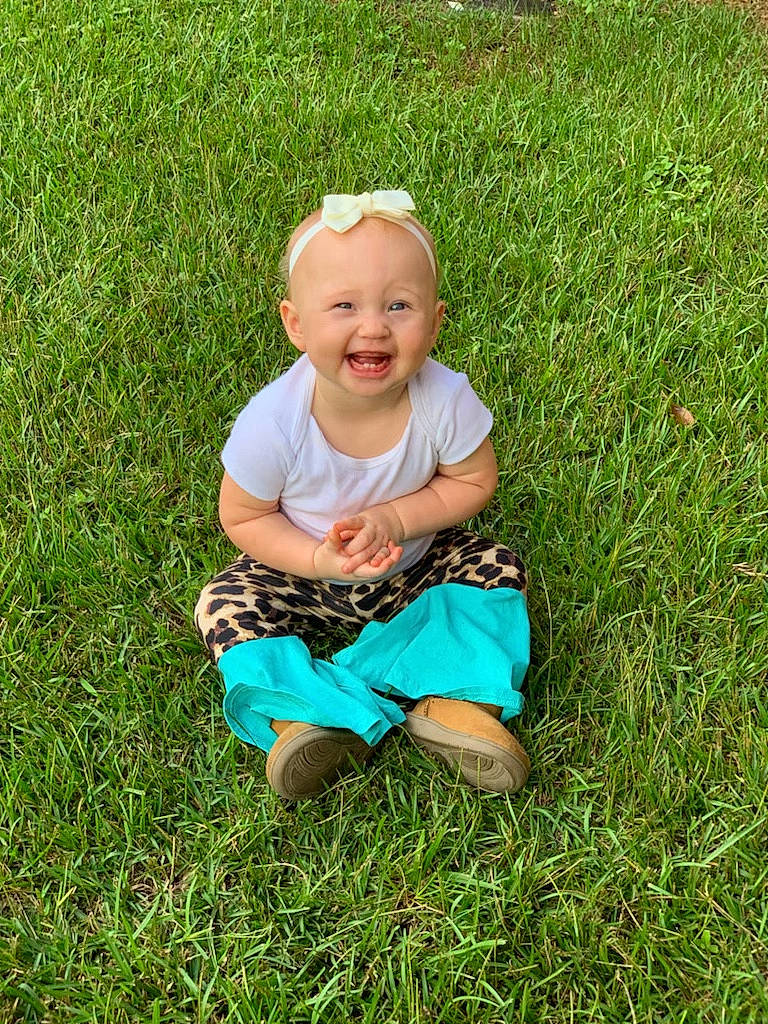 Mallory joined the competition — help win amazing prizes! baby, baby_toddler_clothing, fun, garden, grass, grass_family, grassland, groundcover, happy, joy, lawn, meadow, pattern, people_in_nature, person, plant, portrait_photography, prairie, sitting, smile