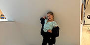 Brooklyn joined the competition — help win amazing prizes! child, girl, posing, art_gallery, platform, modern_art, floor, wooden_floor, white_wall, casual_clothing, braids, black_pants, blue_top, crocs, indoor, minimalist, playful, young_person, standing, confidence