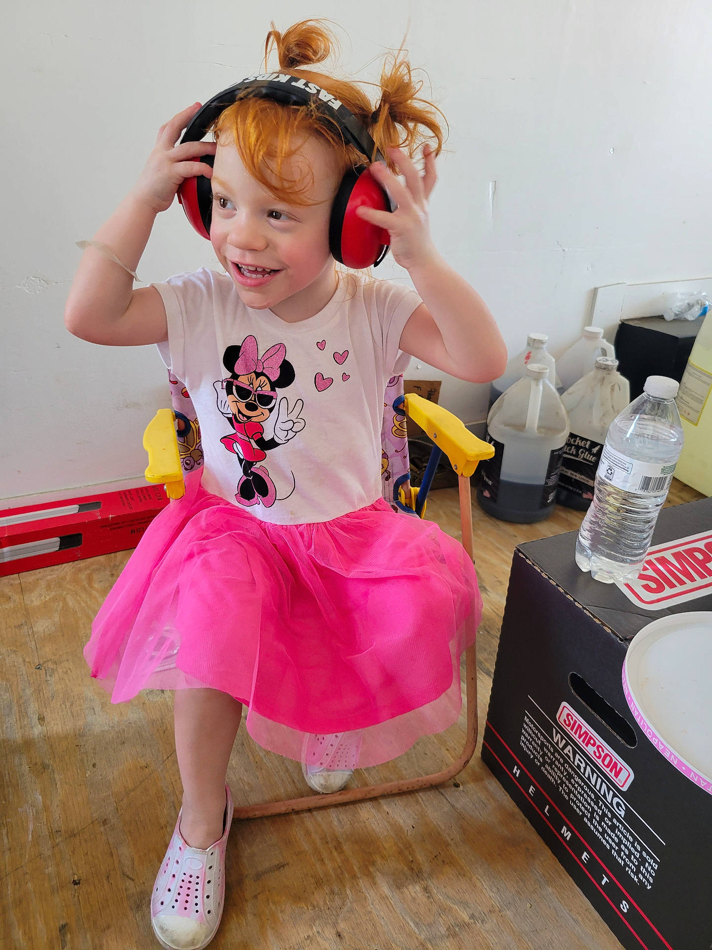Promise is registered to the contest to win money with this photo: bodypart, child, clothing, electronics, face, female, finger, footwear, girl, hand, hardwood, head, headphones, person, photography, plate, portrait, shoe, sitting, wood