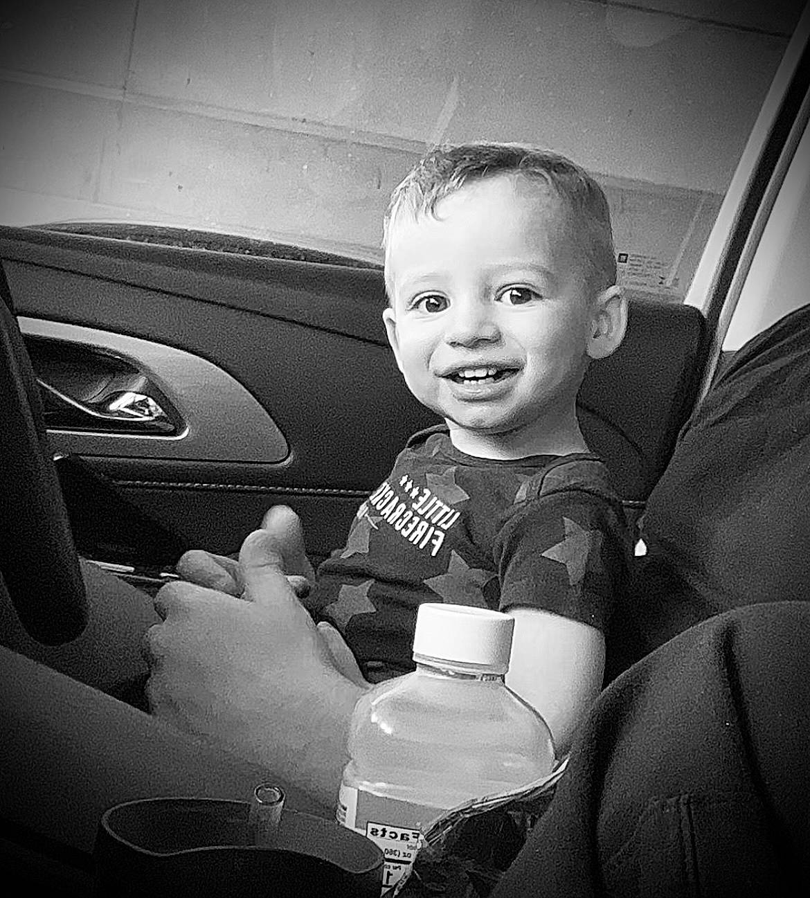 Brody is registered to the contest to win money with this photo: automotive_design, black_and_white, car, cloud, cool, flash_photography, gesture, hand, happy, joy, mode_of_transport, monochrome, monochrome_photography, motor_vehicle, person, personal_luxury_car, smile, steering_wheel, style, tints_and_shades