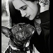 Belle a rejoint le concours — aidez-le/la à gagner de superbes lots ! woman, dog, french_bulldog, portrait, black_and_white, outdoor, sunlight, close_up, leash, jewelry, ring, necklace, long_hair, pet, face, expression, animal, fashion, affection, bond