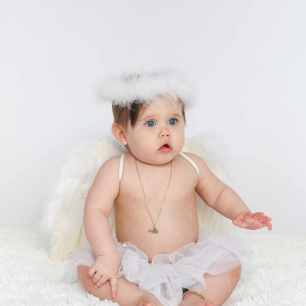 Leighton joined the competition — help win amazing prizes! adorable, angel, baby, bare_chest, blue_eyes, child, costume, cute, expression, feathers, halo, innocent, necklace, portrait, sitting, soft_rug, toddler, tutu, white, wings
