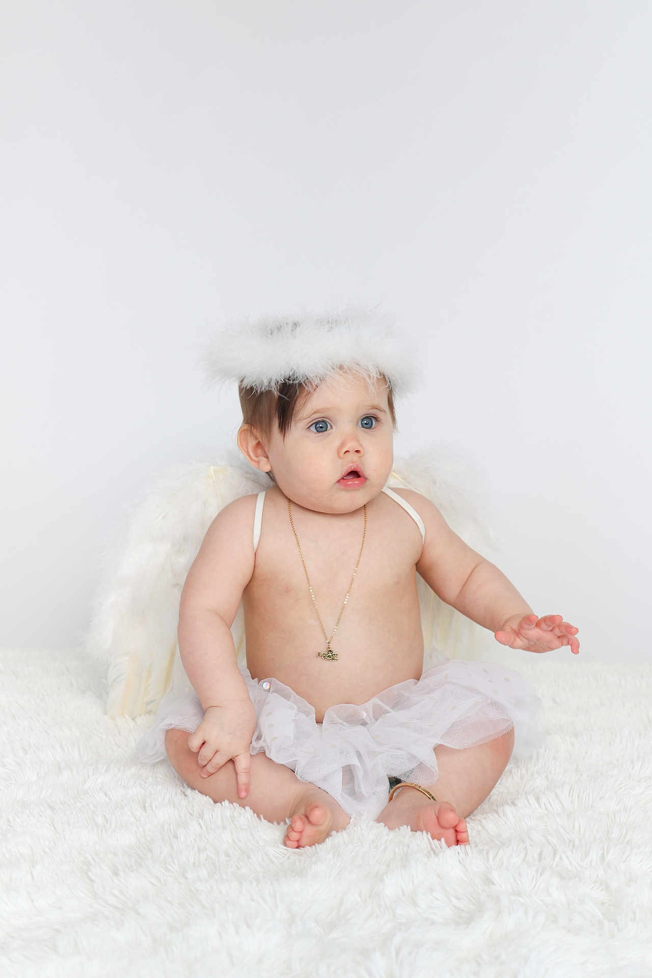 Leighton joined the competition — help win amazing prizes! baby, angel, wings, halo, white, tutu, necklace, bare_chest, sitting, soft_rug, blue_eyes, cute, innocent, portrait, child, costume, feathers, adorable, expression, toddler