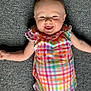 Myleigh is registered to the contest to win money with this photo: baby, infant, smile, happy, colorful_clothing, onesie, carpet, lying_down, child, cheerful, cute, skin, face, arms, indoor, young_child, playful, portrait, closeup, joyful