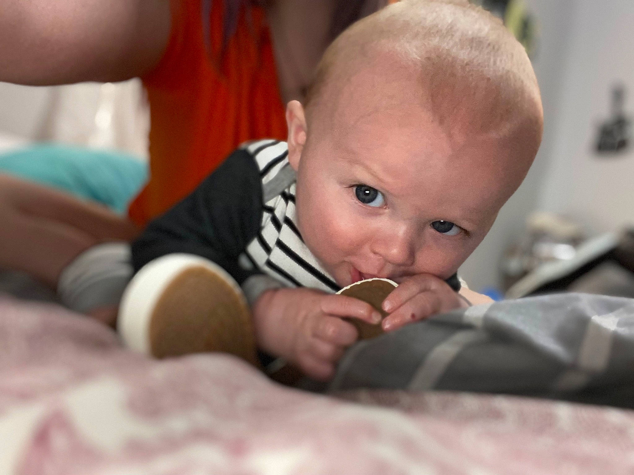 Keegan joined the competition — help win amazing prizes! baby, baby_products, baby_toddler_clothing, child, comfort, crawling, finger, flash_photography, flooring, fun, gesture, grass, happy, linens, person, room, sitting, smile, toddler, tummy_time