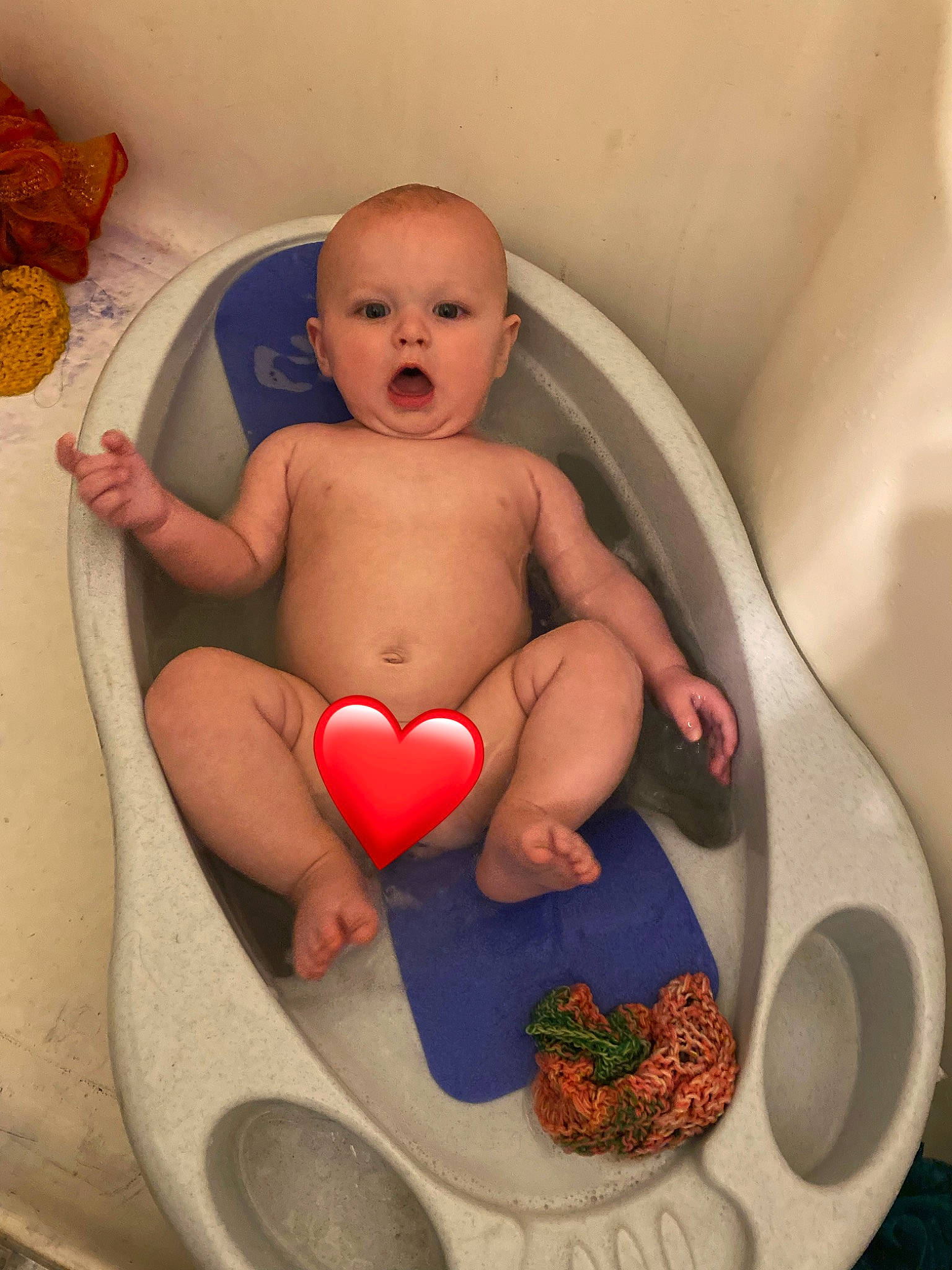 Keegan is registered to the contest to win money with this photo: abdomen, arm, baby, baby_products, bathing, chair, chest, child, comfort, dishware, finger, linens, mouth, person, pink, sitting, skin, stomach, surprise, thigh
