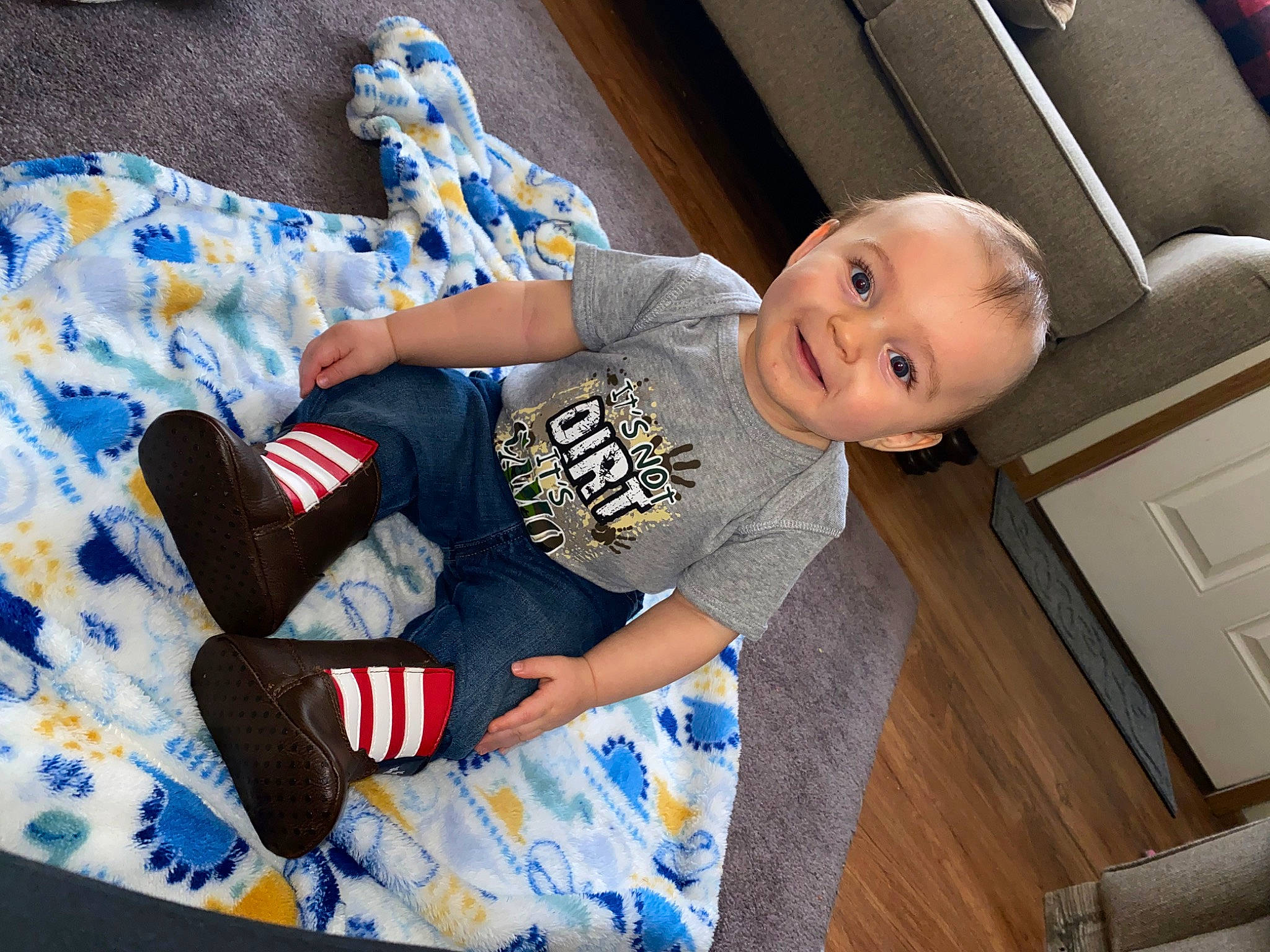 Cason joined the competition — help win amazing prizes! baby, baby_toddler_clothing, child, comfort, door, electric_blue, finger, floor, flooring, human_leg, joy, leg, linens, pattern, person, product, sleeve, smile, sock, t_shirt