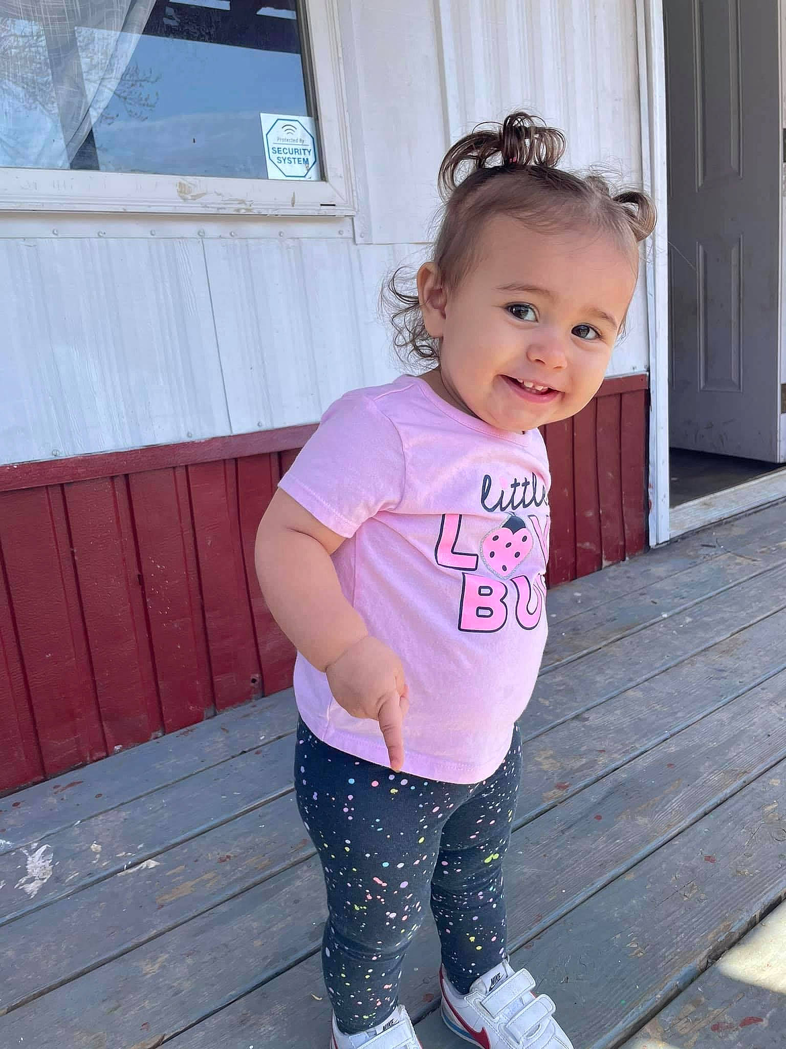 Alayah is registered to the contest to win money with this photo: baby_toddler_clothing, clothing, hairstyle, happy, joint, joy, knee, magenta, person, pink, purple, shoulder, sleeve, standing, street_fashion, t_shirt, thigh, toddler, waist, white