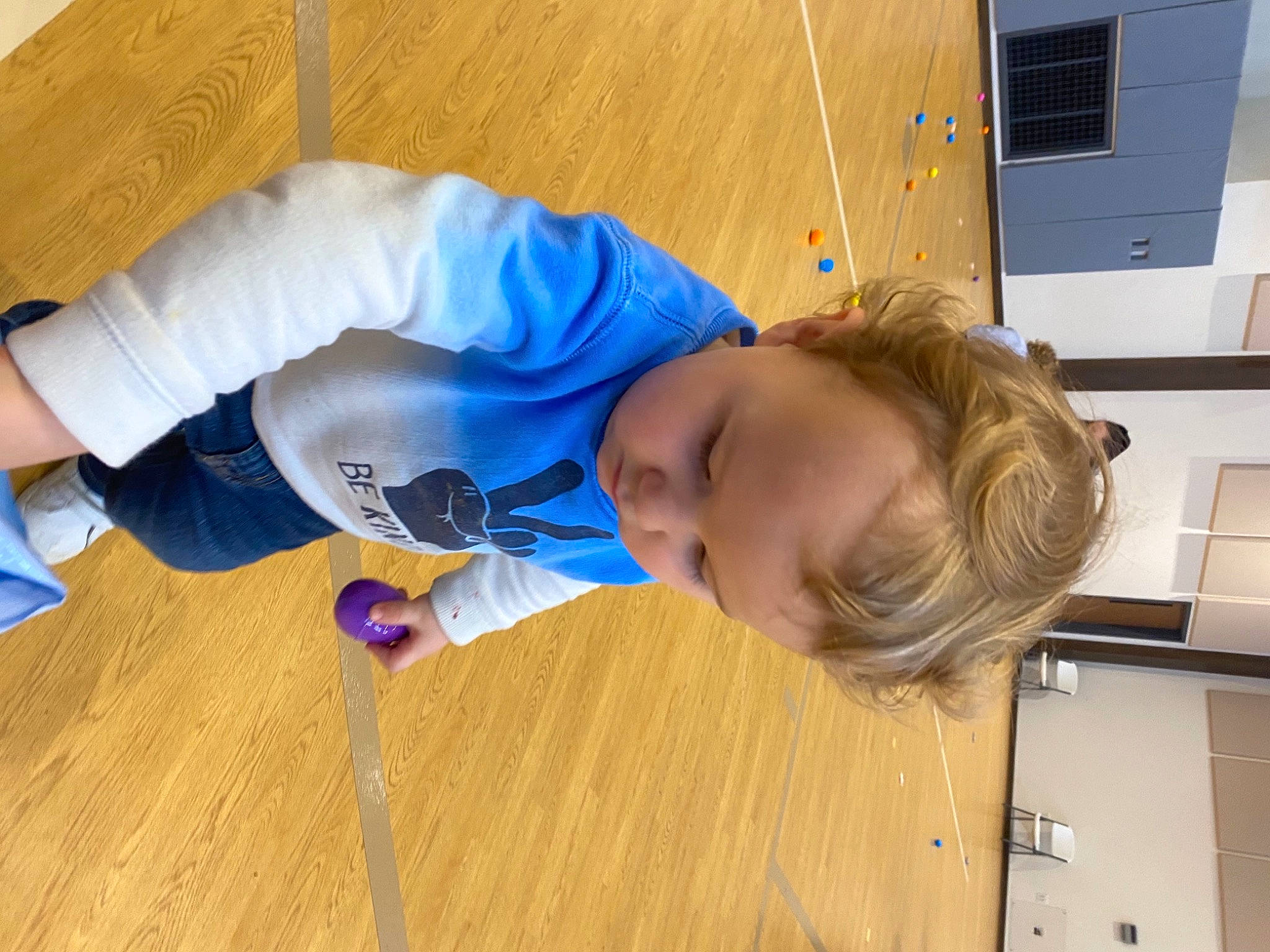 Patrick is registered to the contest to win money with this photo: baby, baby_toddler_clothing, child, comfort, electric_blue, flooring, fun, hardwood, laminate_flooring, orange, person, play, room, sitting, t_shirt, toddler, varnish, wood, wood_flooring, wood_stain