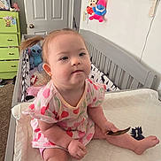 Ivanna joined the competition — help win amazing prizes! baby, bedroom, carpet, changing_table, child, cute, door, drawer, dress, furniture, indoor, person, pink, pony_tail, stitch, stuffed_toys, toddler, toy, wall_decor, white