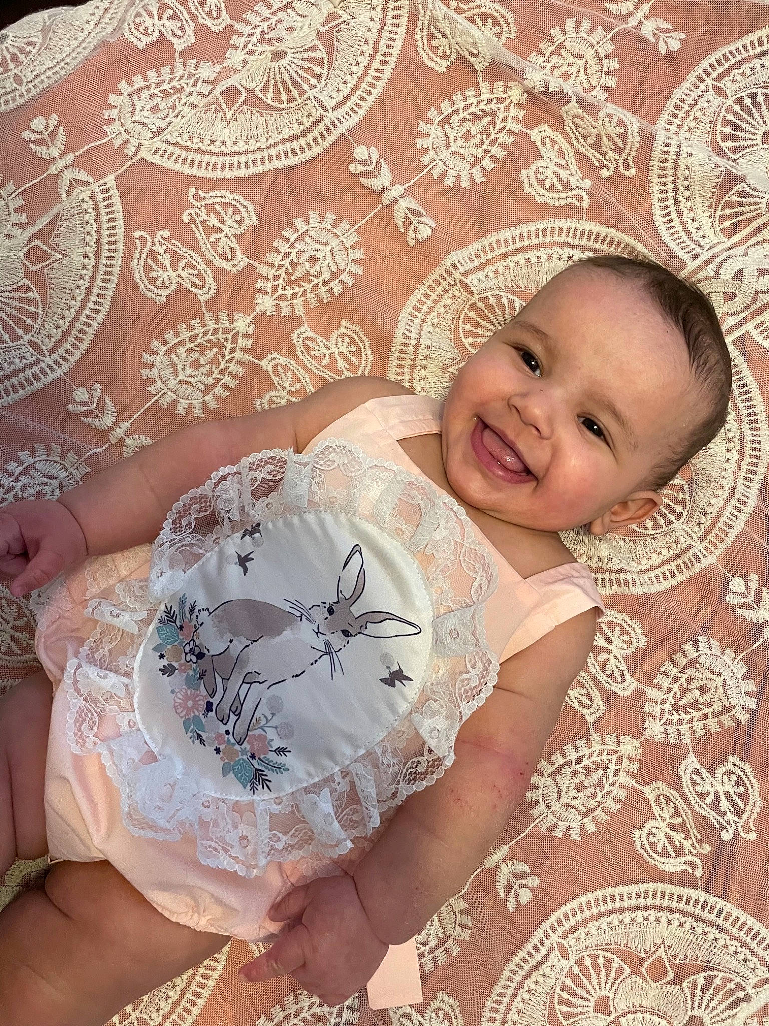 Kyla is registered to the contest to win money with this photo: baby, baby_toddler_clothing, child, comfort, day_dress, dress, embellishment, fashion_accessory, hair_accessory, happy, headgear, joy, linens, pattern, person, pink, skin, smile, textile, toddler