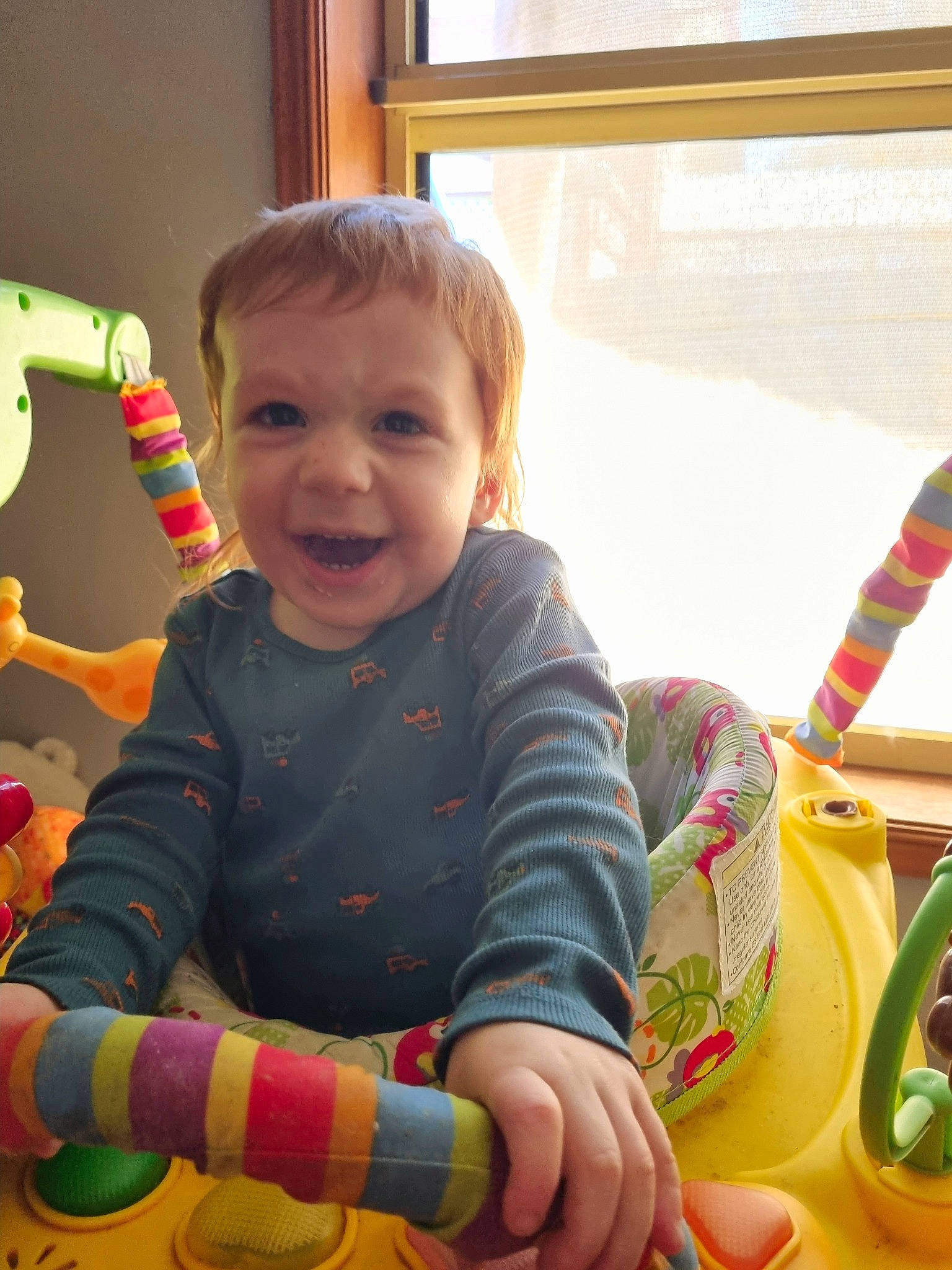 Levi is registered to the contest to win money with this photo: baby, baby_playing_with_toys, baby_toddler_clothing, baby_toys, child, face, facial_expression, finger, fun, happy, head, organ, person, play, room, sitting, smile, thumb, toddler, toy