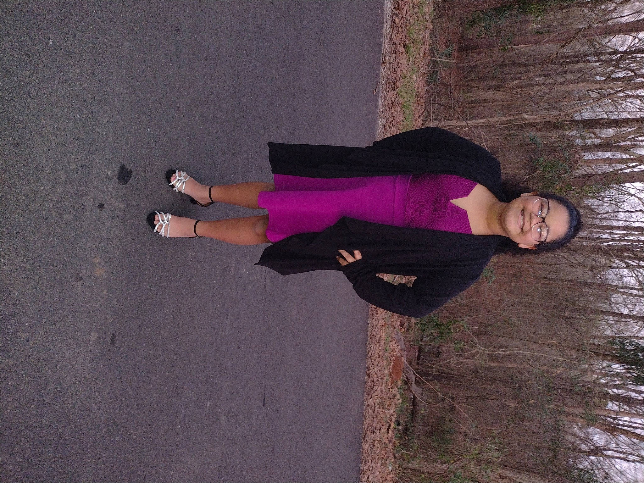 Leah is registered to the contest to win money with this photo: active_pants, boot, electric_blue, fun, grey, happy, human_leg, joy, knee, people_in_nature, person, plant, smile, sportswear, sweatpant, thigh, tints_and_shades, tree, waist, wall