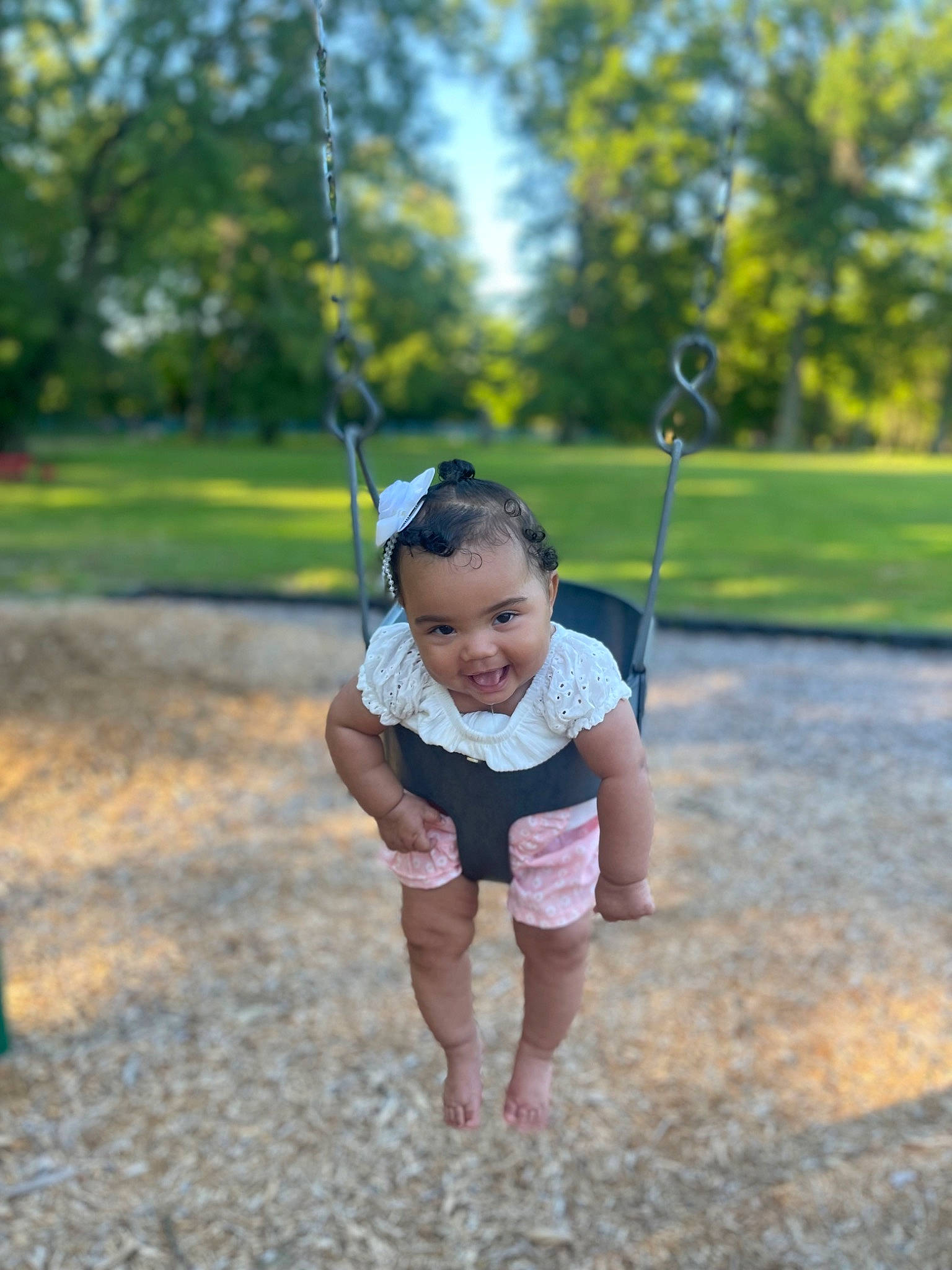 Aloura joined the competition — help win amazing prizes! arm, baby, baby_toddler_clothing, child, city, face, fun, grass, hand, happy, joy, leisure, people_in_nature, person, plant, playground, recreation, sleeve, swing, t_shirt