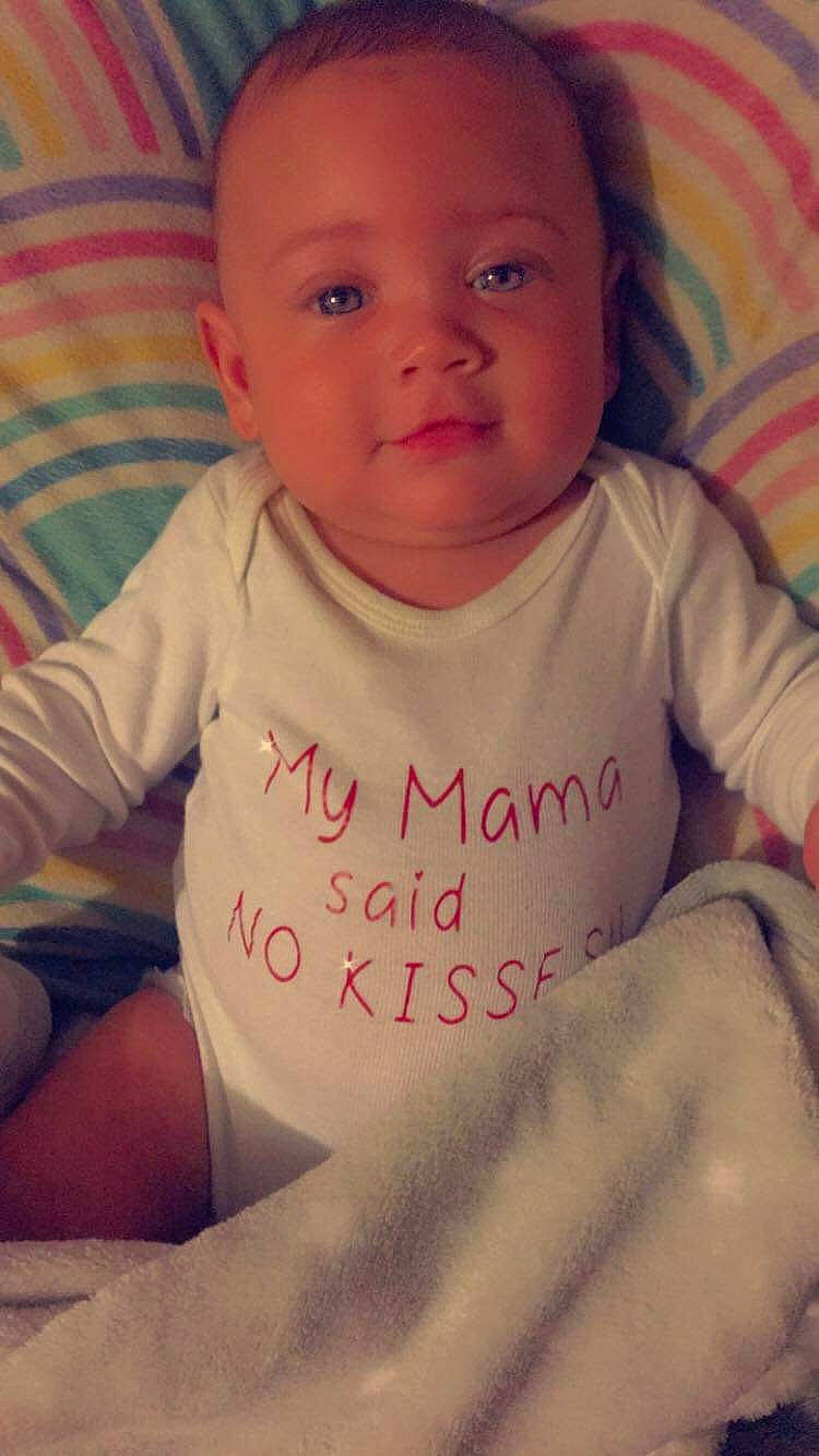 Angel is registered to the contest to win money with this photo: baby_toddler_clothing, cheek, chin, comfort, eye, eyebrow, face, facial_expression, forehead, hair, head, lip, mouth, neck, nose, outerwear, person, skin, sleeve, smile