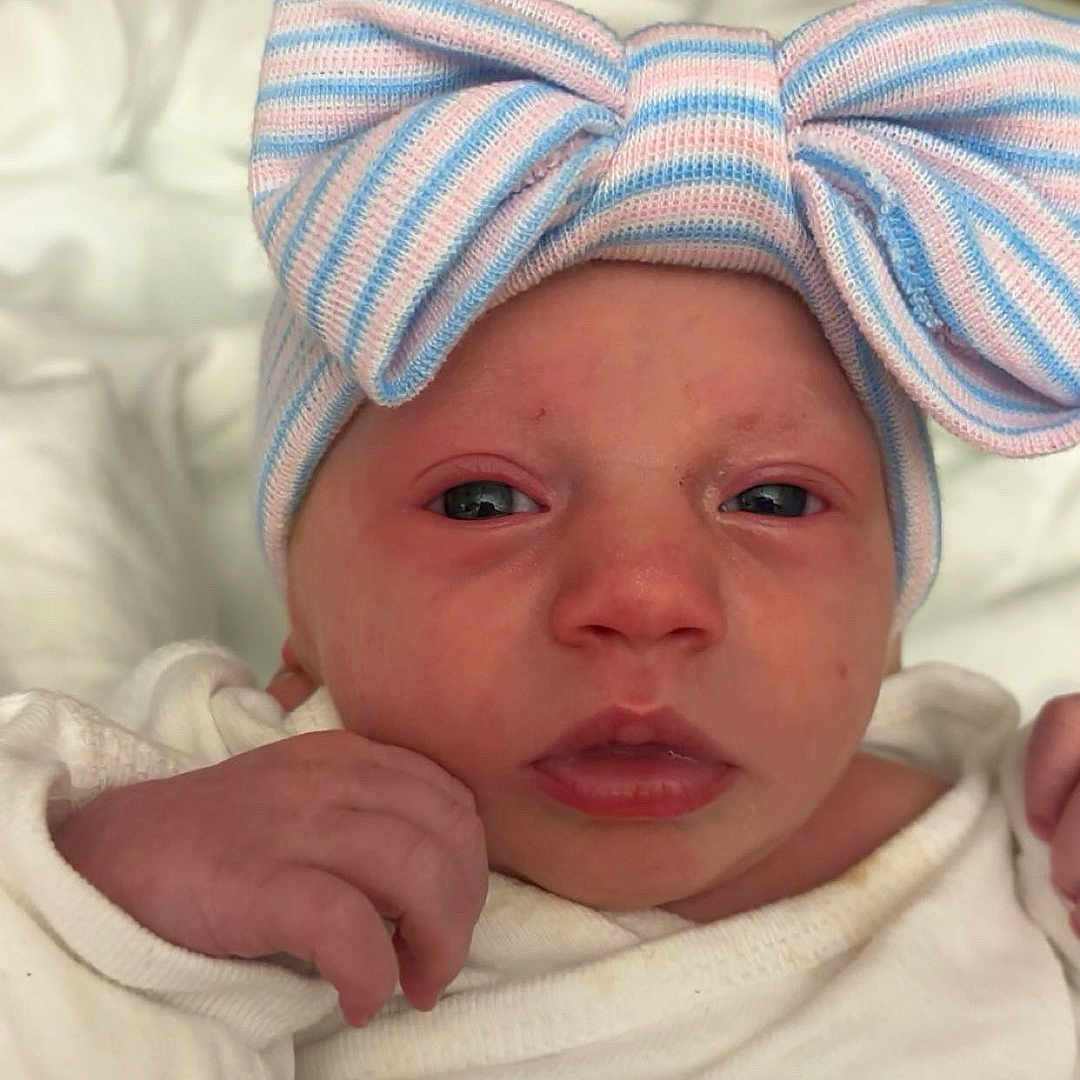 Aubreigh joined the competition — help win amazing prizes! architecture, baby, bed, blanket, building, clothing, cushion, face, furniture, glove, hat, head, homedecor, hospital, newborn, person, photography, portrait, quilt, sleeping