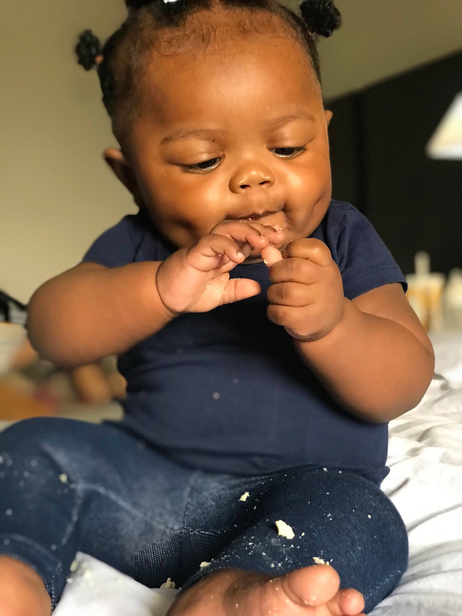 Maliyah is registered to the contest to win money with this photo: arm, baby_toddler_clothing, black, cheek, chin, ear, finger, food_craving, gesture, happy, human, iris, lip, mouth, nail, nose, person, photograph, skin, thumb