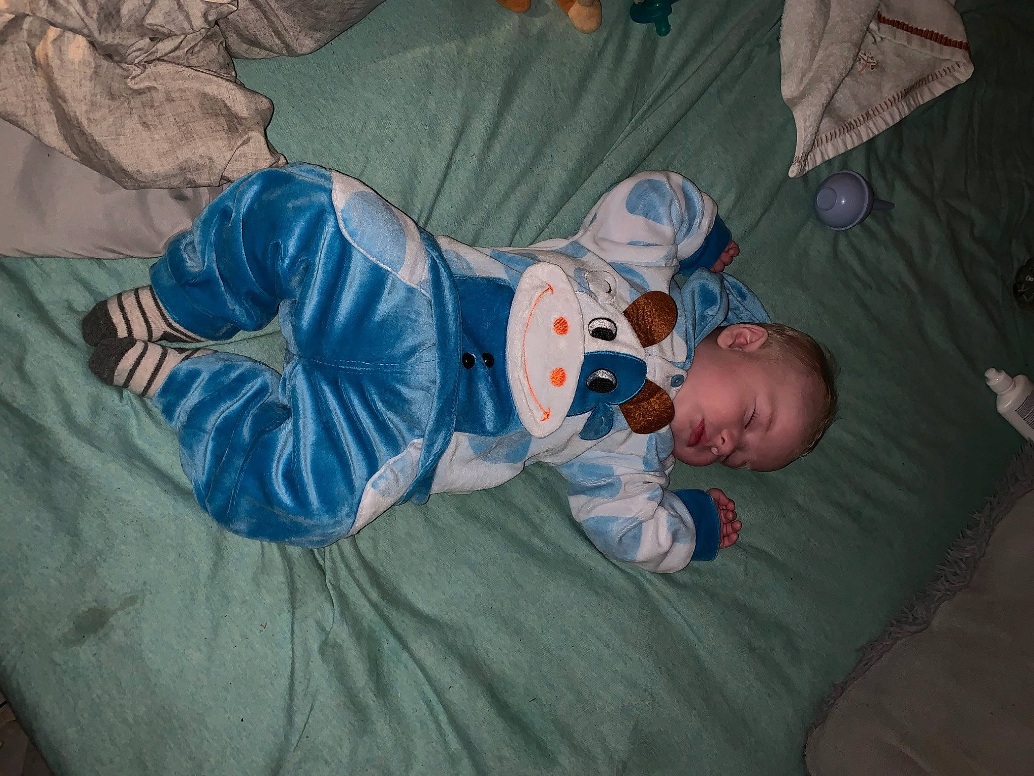 James is registered to the contest to win money with this photo: baby, baby_products, baby_toddler_clothing, bedtime, child, comfort, fun, grass, hat, linens, mouth, nap, person, room, sitting, sleep, sleeve, toddler, tree, vacation