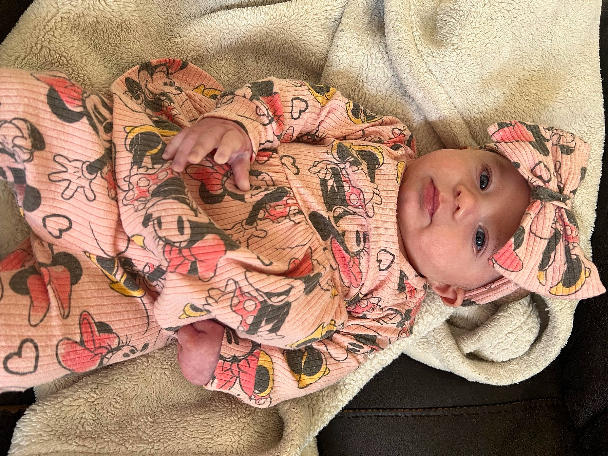 Scarlett is registered to the contest to win money with this photo: baby, baby_toddler_clothing, cheek, child, comfort, eye, head, headgear, headwear, human, human_body, linens, lip, mammal, pattern, person, pink, skin, sleeve, toddler