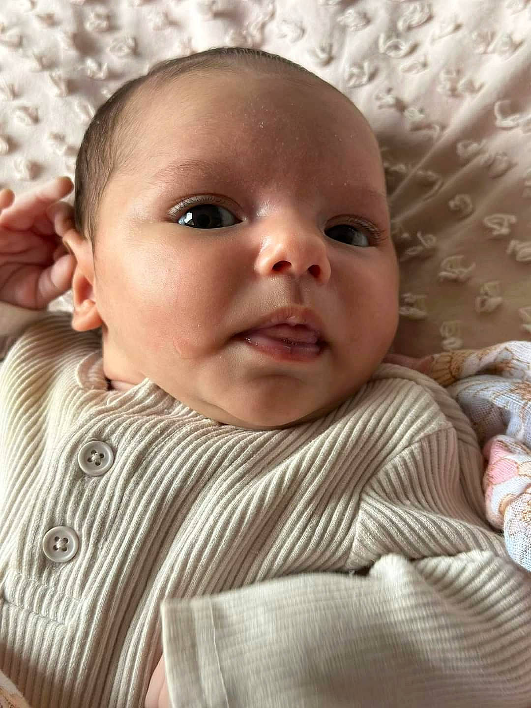 Nilah is registered to the contest to win money with this photo: baby, baby_toddler_clothing, cheek, child, chin, comfort, eye, eyebrow, eyelash, facial_expression, happy, head, iris, linens, lip, mouth, nose, person, skin, sleeve