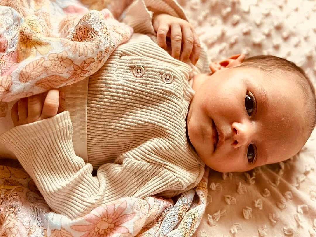 Nilah joined the competition — help win amazing prizes! baby, baby_toddler_clothing, cheek, child, comfort, grass, hairstyle, happy, headgear, lip, mammal, nose, pattern, people_in_nature, person, product, skin, sleeve, toddler, vertebrate