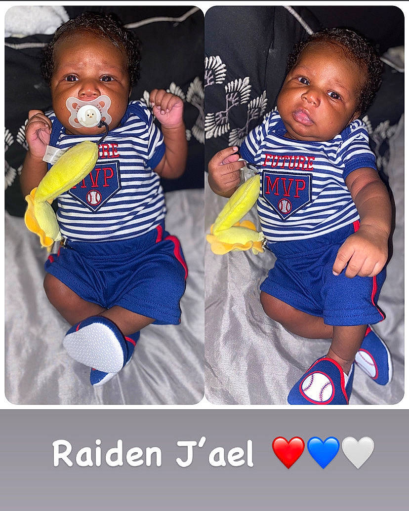 Raiden is registered to the contest to win money with this photo: baby, baby_products, baby_toddler_clothing, child, cool, electric_blue, facial_expression, finger, font, fun, gesture, happy, head, person, photo_caption, shirt, shorts, sleeve, standing, t_shirt