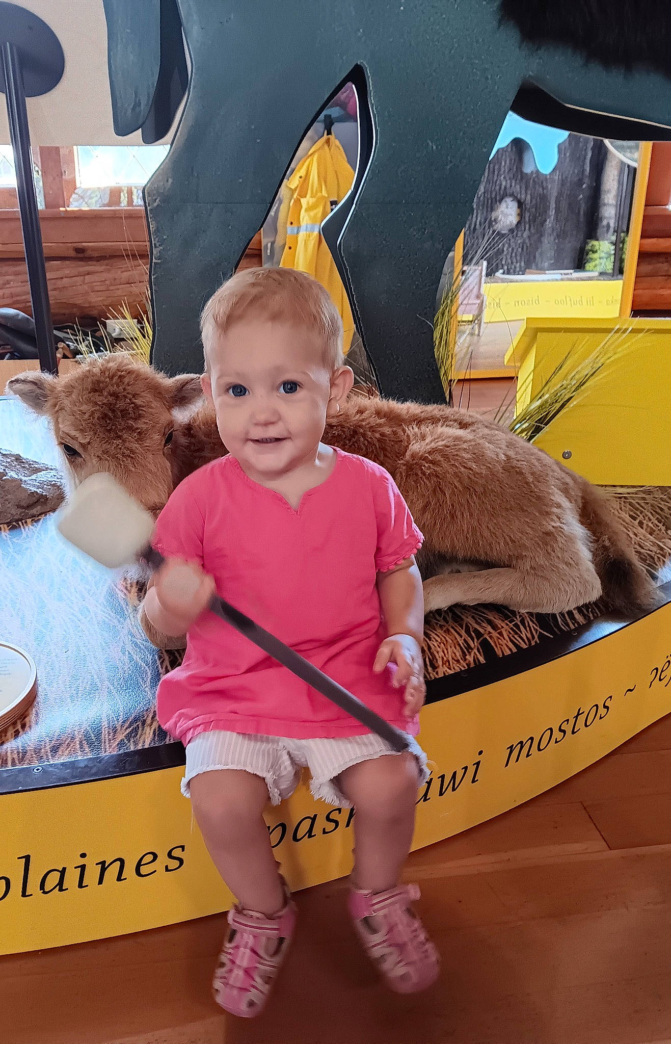 Prairie is registered to the contest to win money with this photo: art, automotive_design, automotive_exterior, baby, baby_toddler_clothing, carton, child, foot, fun, happy, joy, leisure, motor_vehicle, peach, person, play, recreation, room, sitting, smile