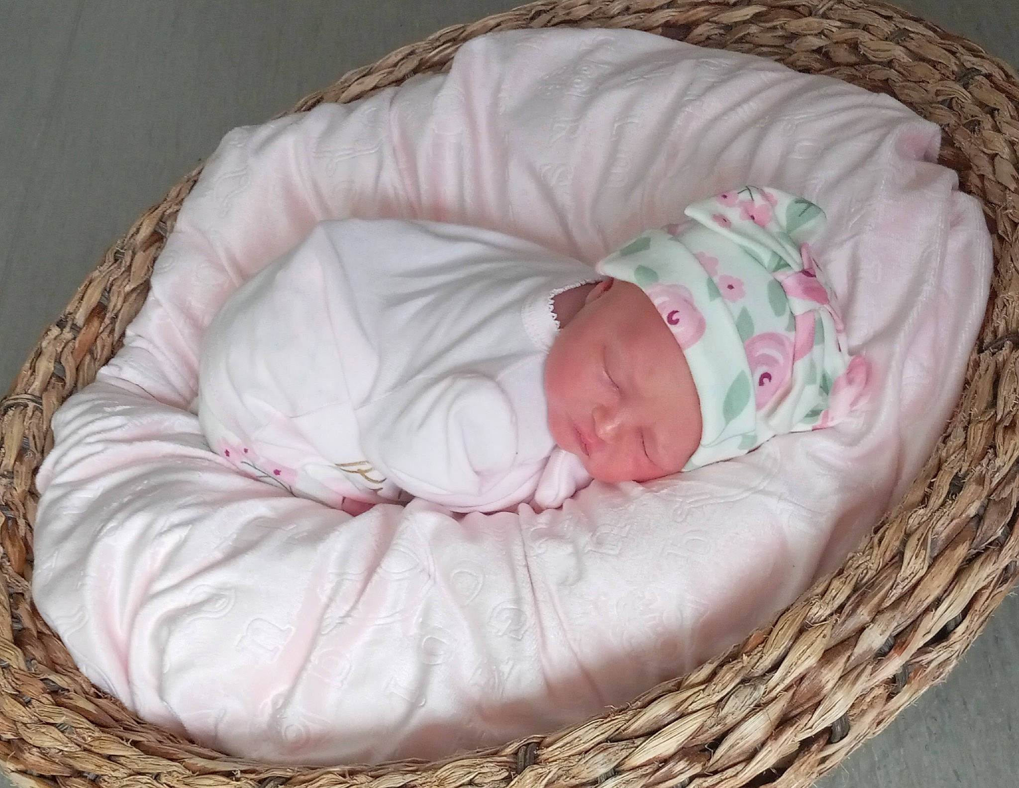 Iona is registered to the contest to win money with this photo: baby, baby_products, baby_safety, baby_sleeping, baby_toddler_clothing, basket, bedtime, cap, child, comfort, face, head, headwear, infant_bed, linens, nap, pattern, person, sleep, sleeve