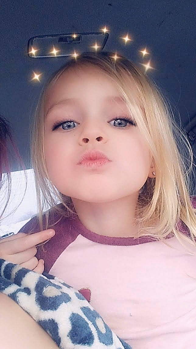 Maddison is registered to the contest to win money with this photo: bangs, black_hair, cheek, cool, ear, eyebrow, eyelash, flash_photography, gesture, happy, iris, jaw, lip, neck, nose, person, pink, shoulder, skin, sleeve