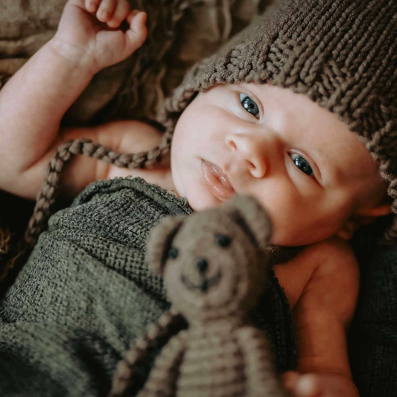 Colter is registered to the contest to win money with this photo: baby, beanie, blanket, bodypart, bonnet, cap, clothing, face, finger, hand, happy, hat, head, knitwear, newborn, person, photography, portrait, sleeping, smile