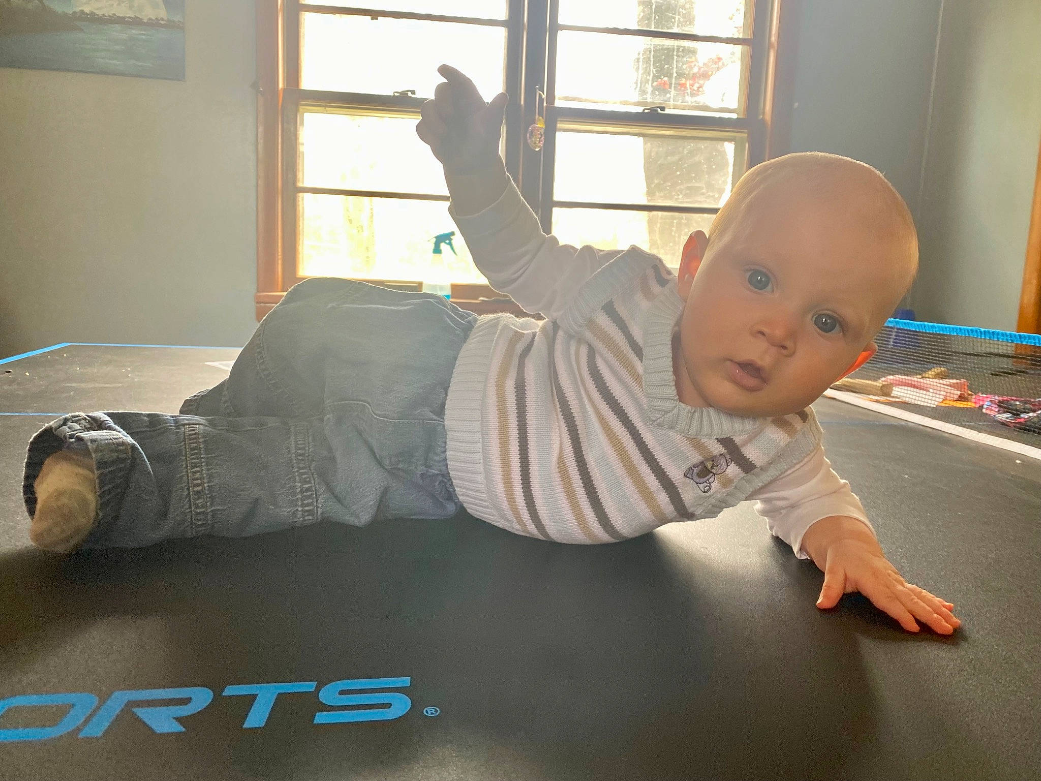 Emmitt joined the competition — help win amazing prizes! baby, baby_toddler_clothing, barefoot, child, comfort, crawling, elbow, floor, flooring, foot, hardwood, human_leg, knee, leg, leisure, person, sitting, thigh, toddler, window