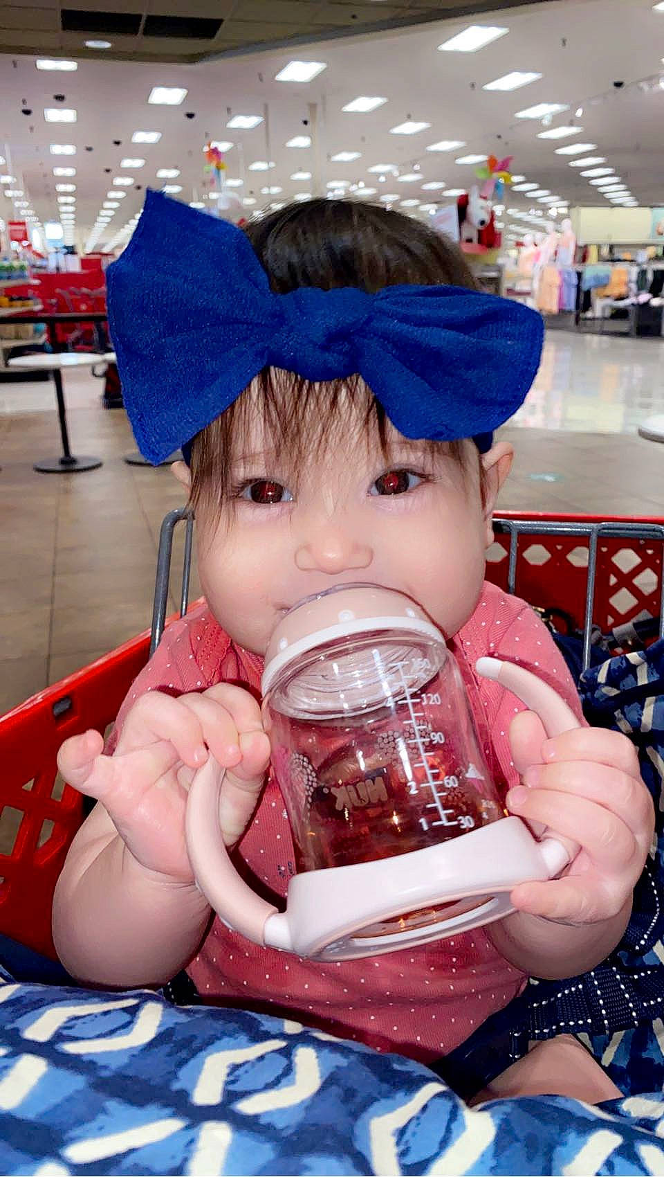 Aspynn is registered to the contest to win money with this photo: baby, chair, child, comfort_food, costume_hat, drink, drinking, drinkware, fictional_character, fun, hand, hat, nail, pattern, person, photograph, sitting, skin, snapshot, textile