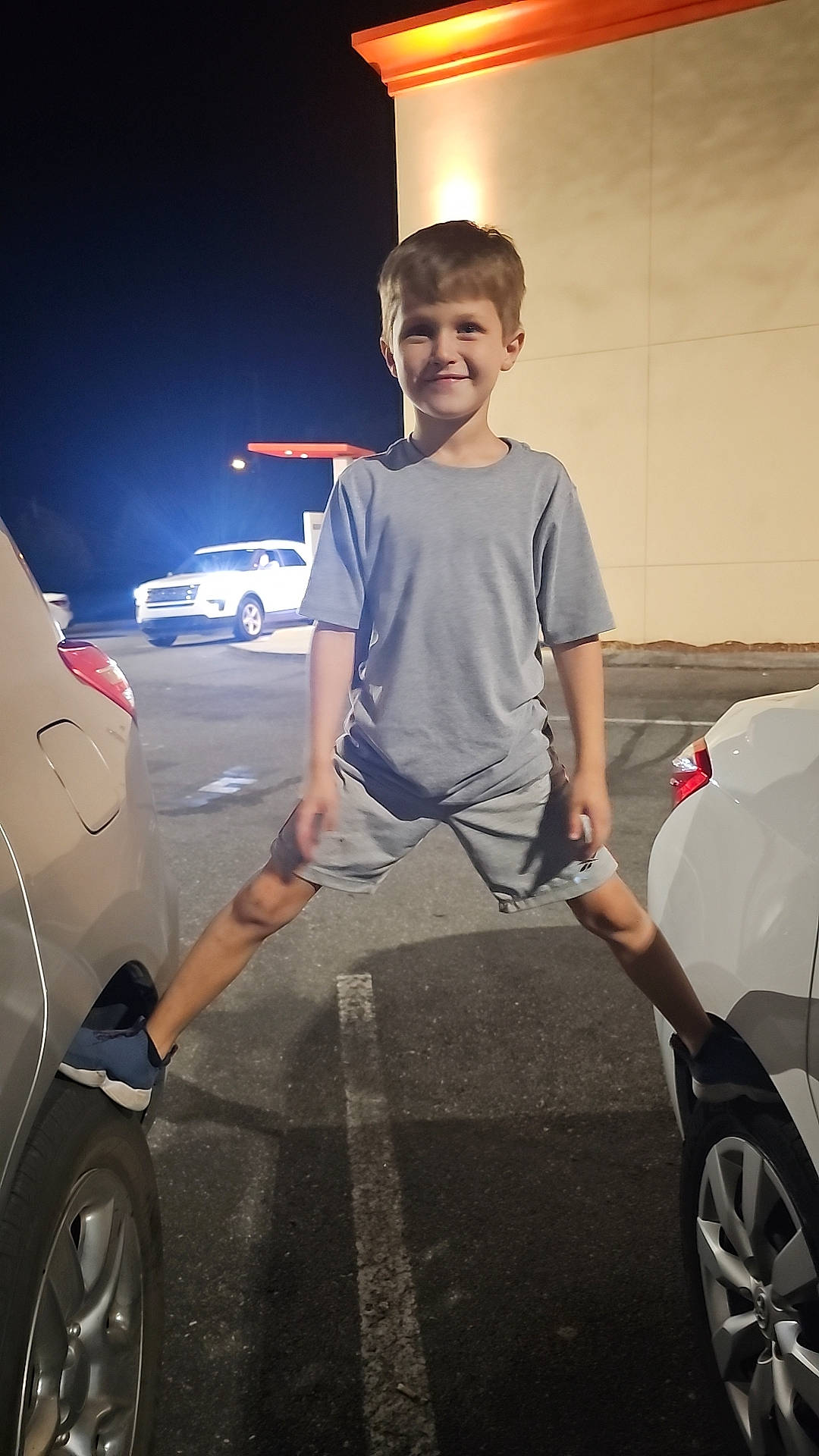 Luka joined the competition — help win amazing prizes! asphalt, automotive_design, automotive_exterior, automotive_lighting, automotive_tire, bumper, car, cool, hood, joy, motor_vehicle, person, personal_luxury_car, rolling, shorts, smile, t_shirt, tire, trunk, vehicle