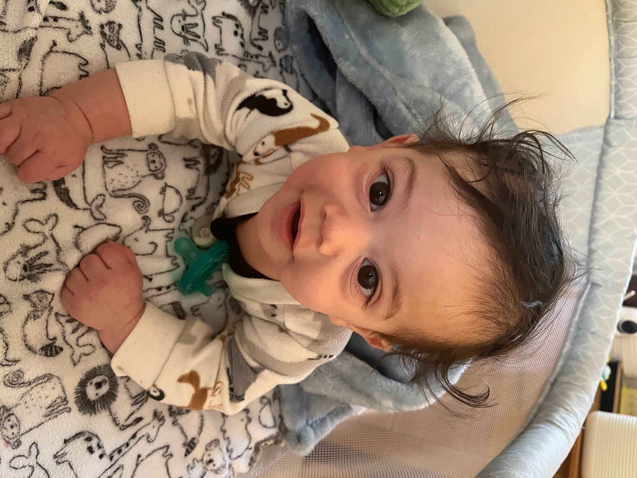 Santino is registered to the contest to win money with this photo: baby_toddler_clothing, cheek, chin, comfort, eye, eyebrow, eyelash, hand, happy, human_body, iris, lip, mouth, neck, nose, person, skin, sleeve, smile, toddler