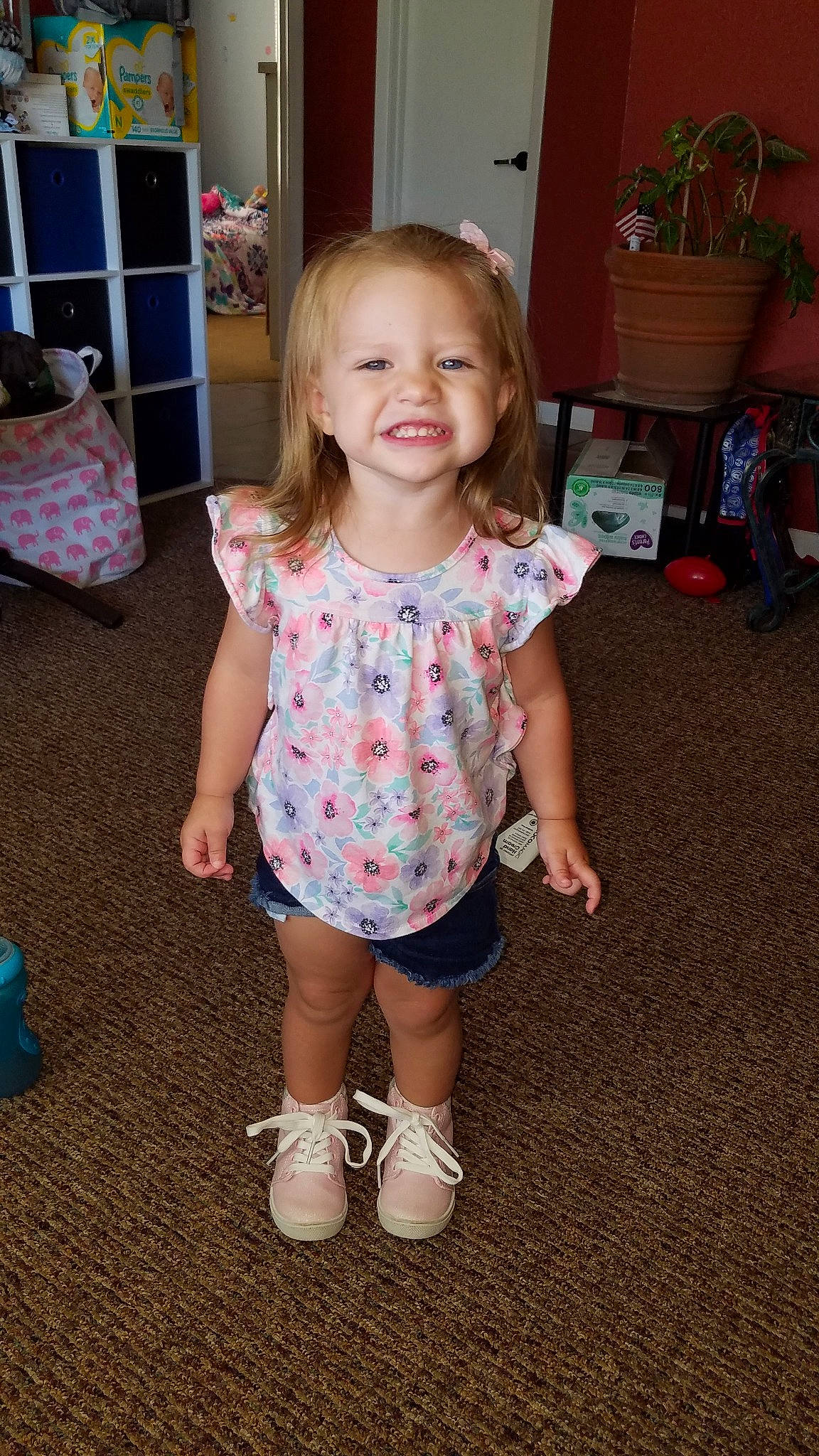 Kamry joined the competition — help win amazing prizes! baby, child, dress, footwear, joy, pattern, person, play, shoe, skin, smile, standing, toddler