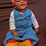 Fatoumata participe au concours pour gagner de l'argent avec cette photo : baby, child, denim_outfit, red_beret, smiling, sitting, couch, indoors, happy, heart_emoji, colorful, clothing, footwear, red_shoes, yellow_sol, portrait, cute, infant, casual, cozy