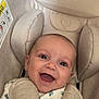 Taytum is registered to the contest to win money with this photo: baby, smiling, infant, car_seat, child, face, happy, cute, young, seatbelt, clothing, head_support, person, portrait, indoors, closeup, baby_clothes, expression, child_seat, joy