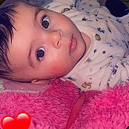 Adam participe au concours pour gagner de l'argent avec cette photo : baby, infant, face, eyes, onesie, blanket, pink, soft, cute, animal_print, closeup, laying_down, child, young, skin, hair, mouth, nose, sleepwear, cozy