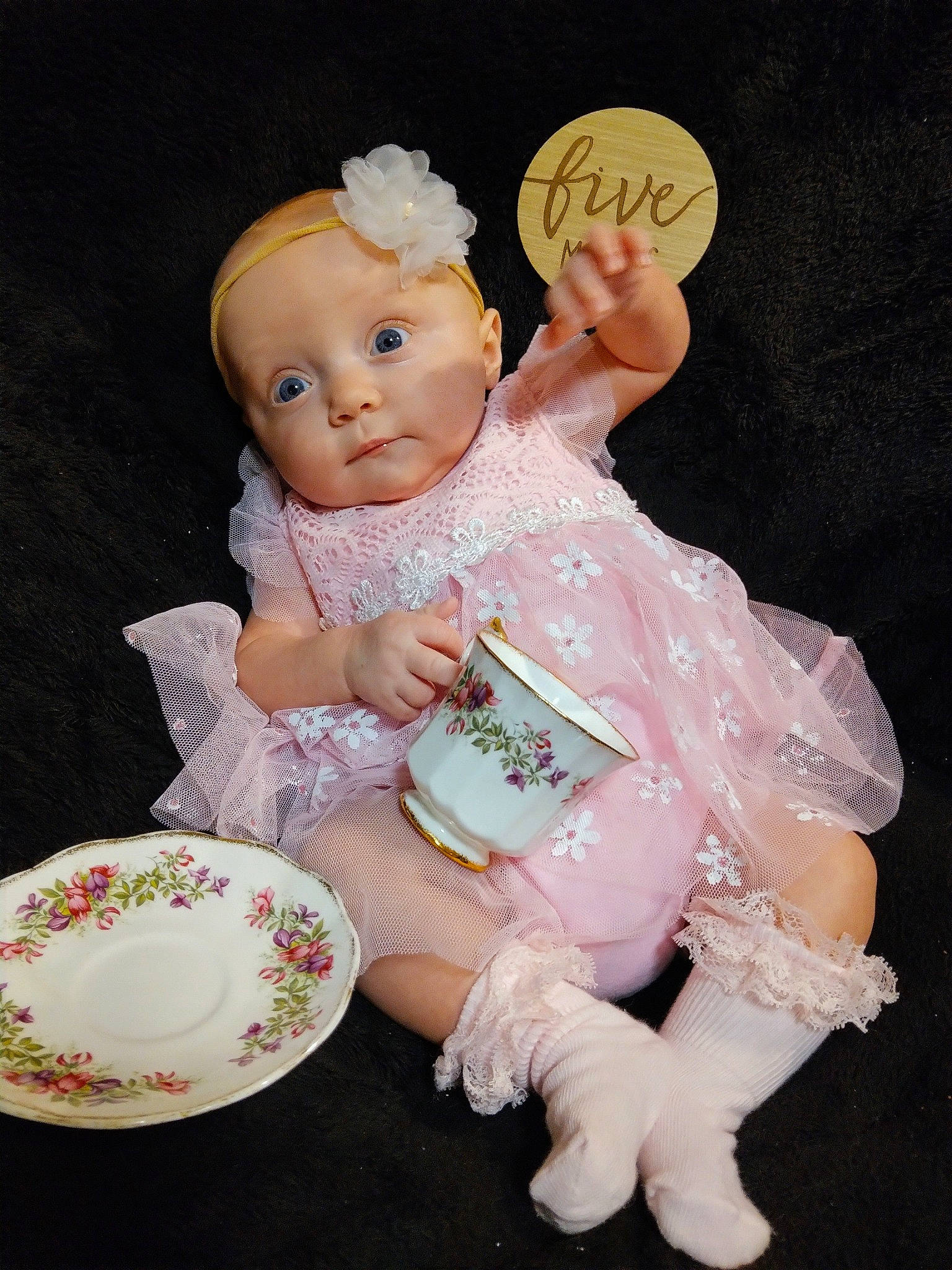 Braylin joined the competition — help win amazing prizes! baby, baby_products, baby_toddler_clothing, cheek, child, dishware, drinkware, gesture, happy, jewellery, peach, person, pink, plate, porcelain, serveware, sitting, sock, tableware, toddler