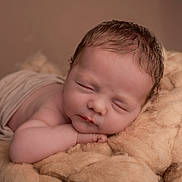 Archie joined the competition — help win amazing prizes! baby, newborn, sleeping, blanket, soft, cozy, wrapped, infant, cute, peaceful, portrait, closeup, skin, head, face, resting, warm, knitted, fuzzy, comfort